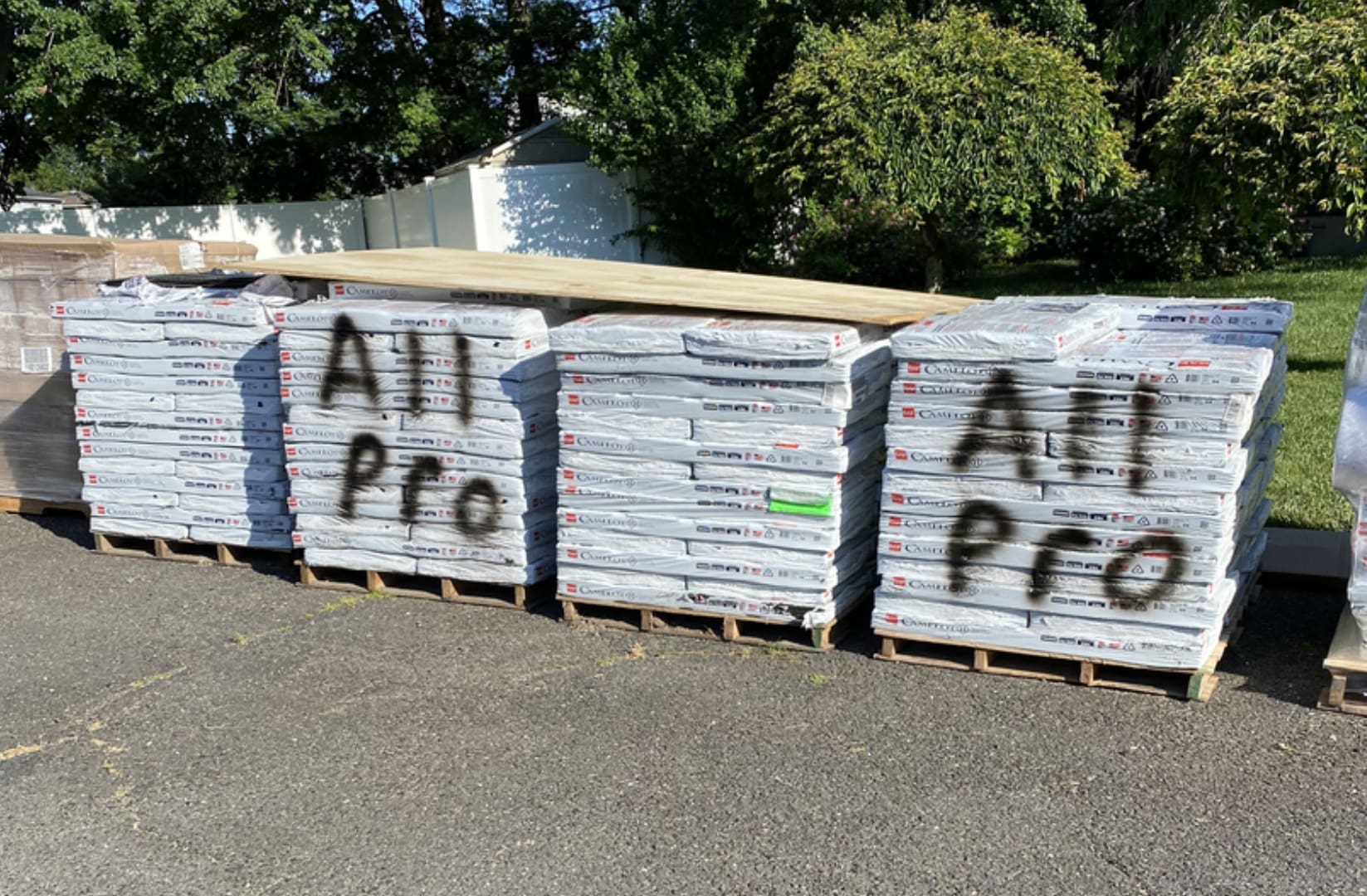 A row of stacks of papers with the words " all pro ".