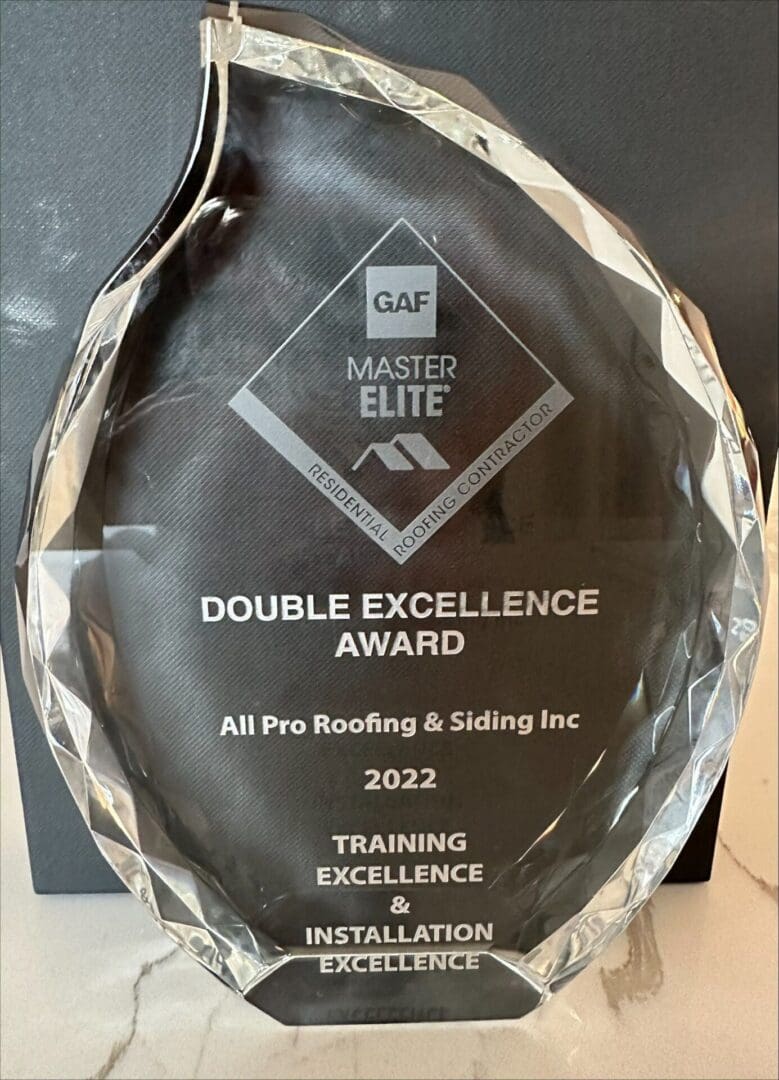 A plaque that says gaf master elite double excellence award.