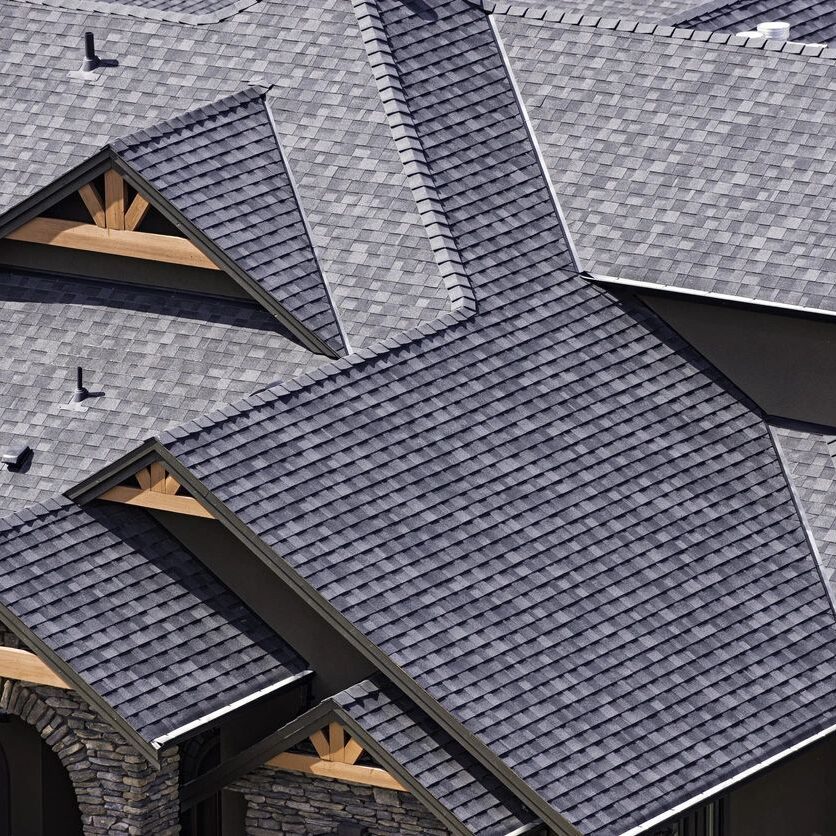 A close up of some houses with their roofs